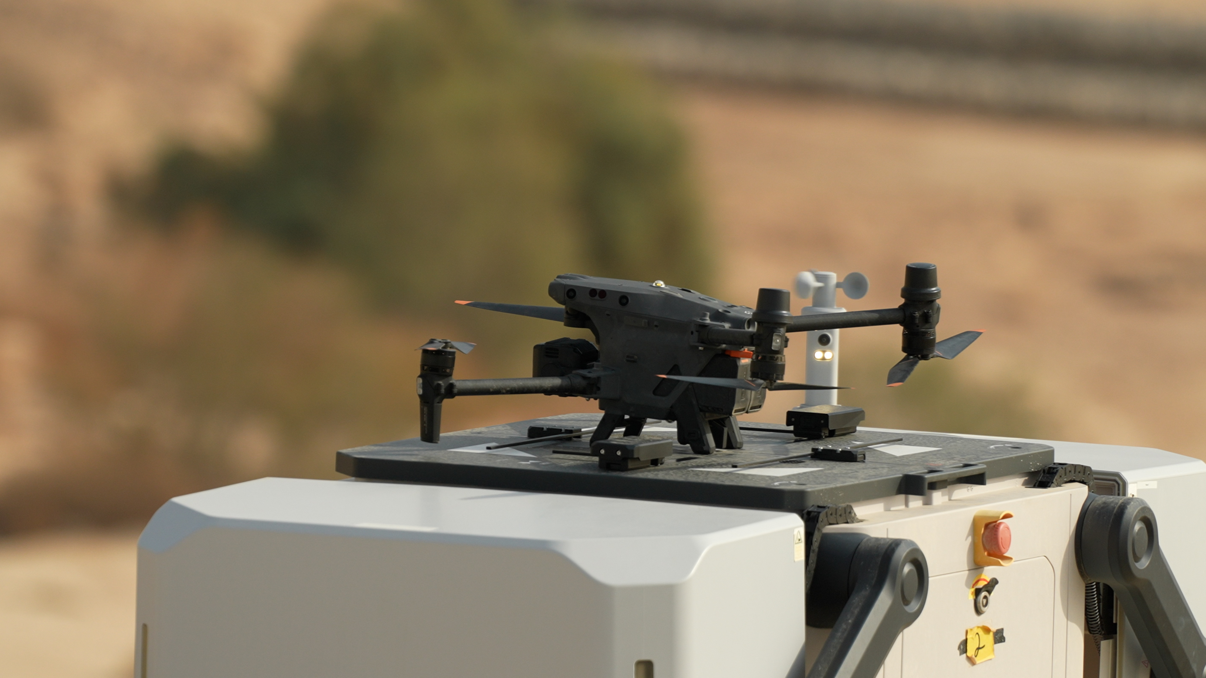 Counter-intrusion drone deploying from a mobile effector box in the field